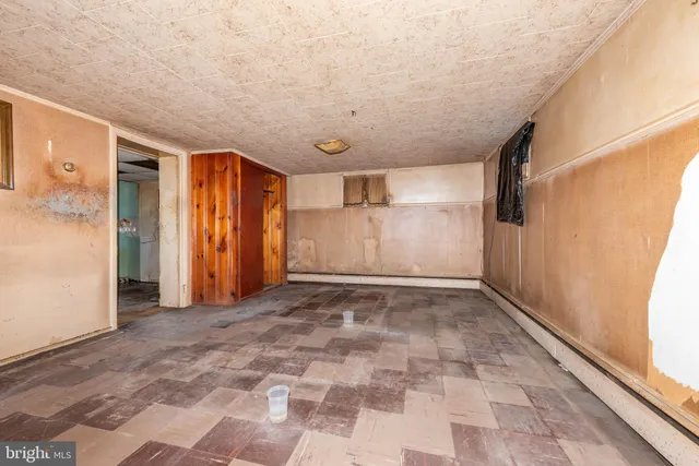 a view of a door and a window