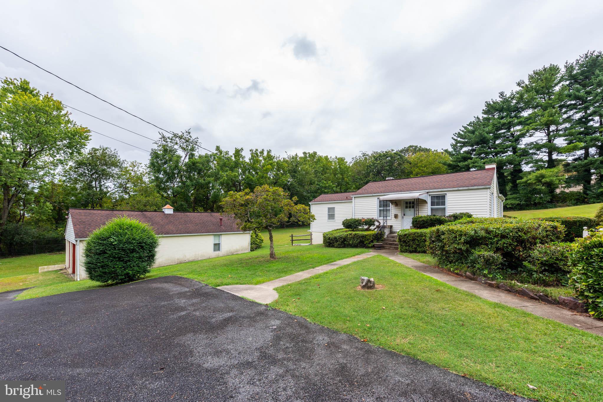 3417 East Joppa Road Baltimore, MD 21234 - Photo 42 of 51 a front view of a house with garden