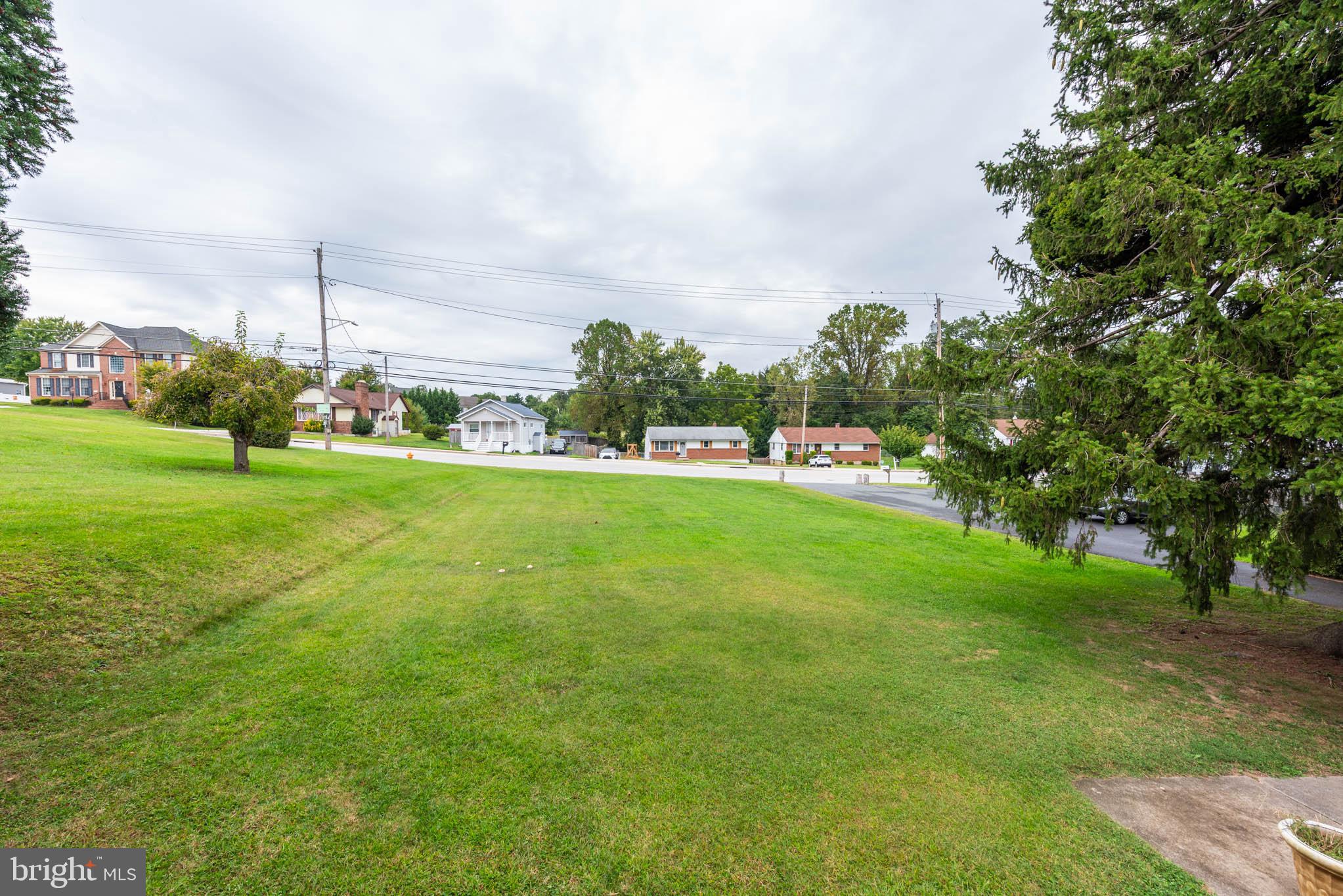 3417 East Joppa Road Baltimore, MD 21234 - Photo 49 of 51 a view of a park with a big yard and large trees