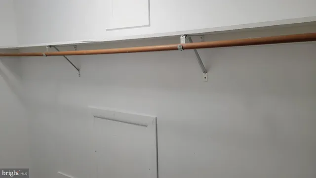 a bathroom with a sink toilet and mirror