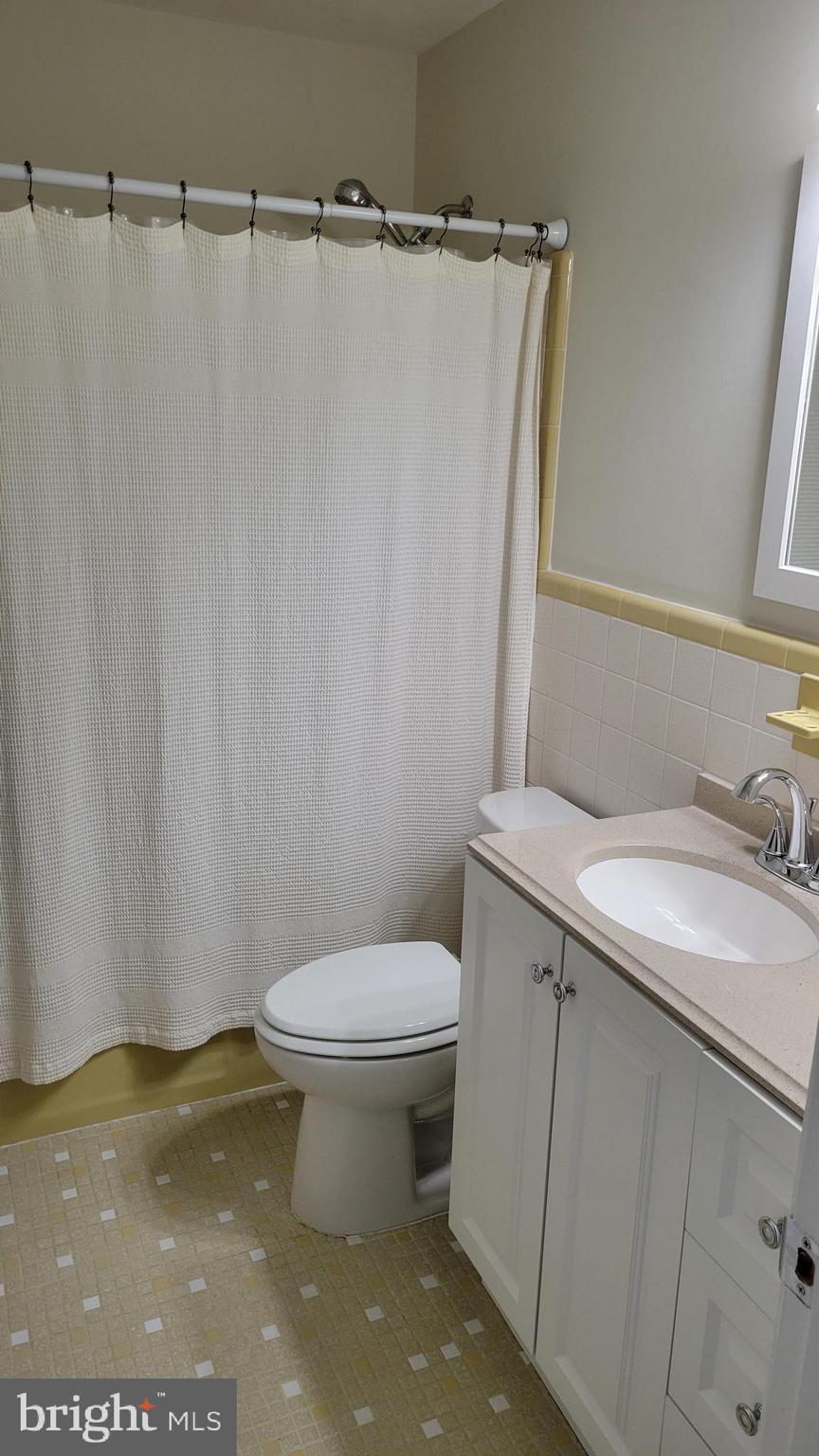 29620 Whalen Road Charlotte Hall, MD 20622 - Photo 10 of 16 a bathroom with a sink and a toilet