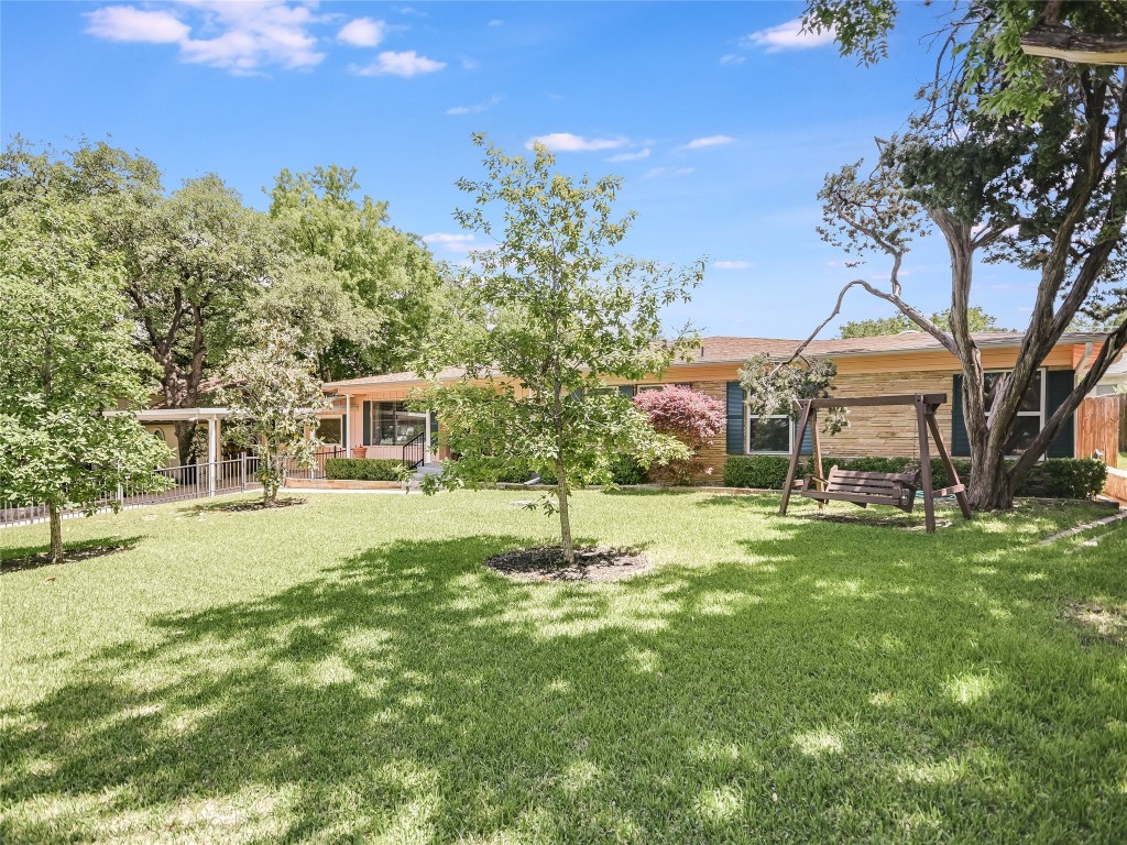 2605 Hillview Road Austin, TX 78703 - Photo 1 of 1 a swimming pool with trees in the background