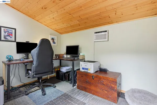a view of a workspace with furniture