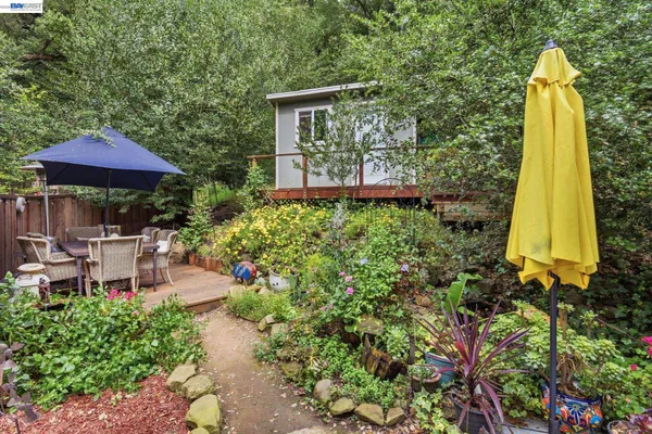 a garden view with a seating space