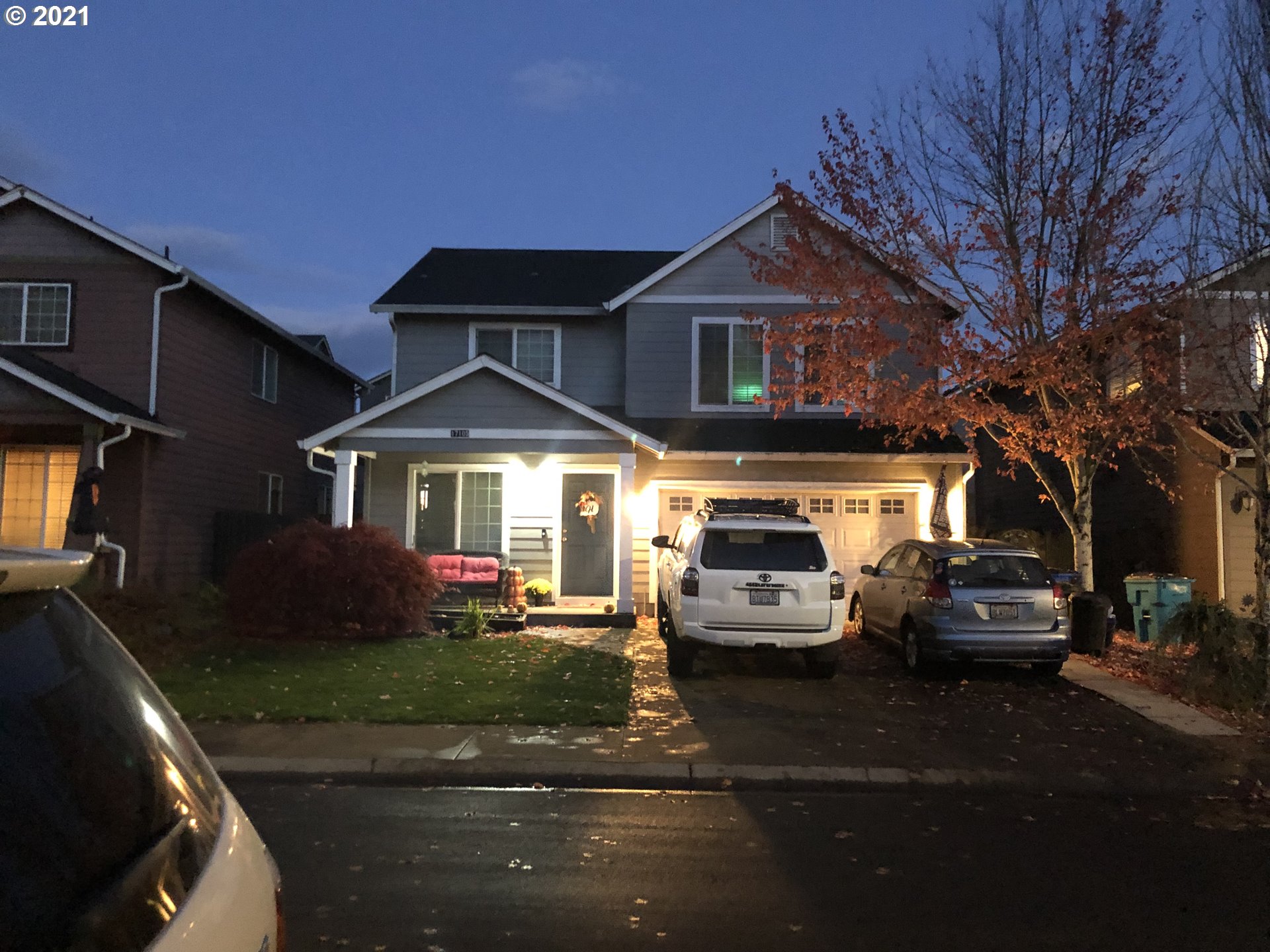 17105 Northeast 13th Place Ridgefield, WA 98642 - Photo 1 of 16 a front view of a house with cars parked
