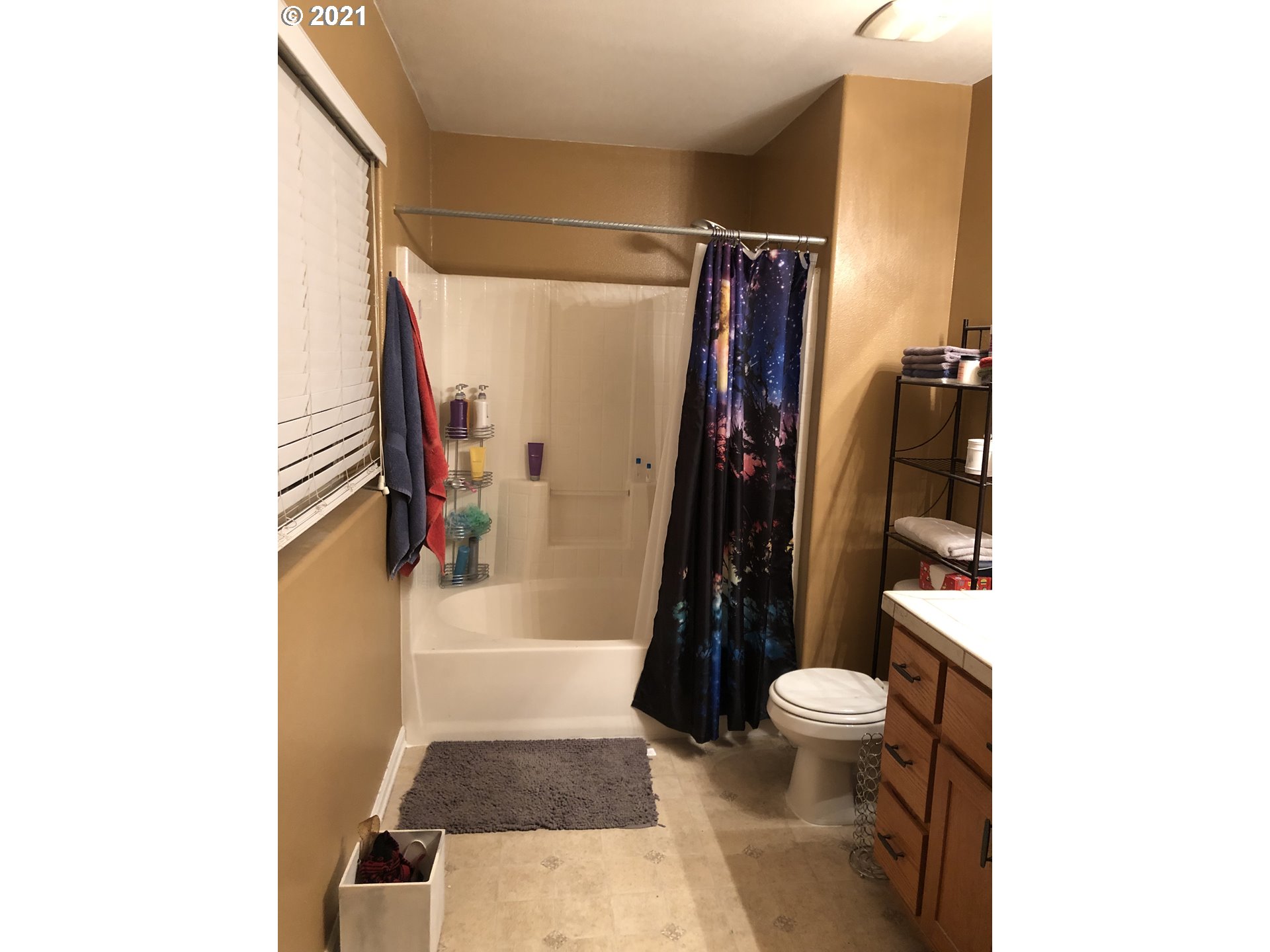 17105 Northeast 13th Place Ridgefield, WA 98642 - Photo 11 of 16 a bathroom with a toilet and a shower