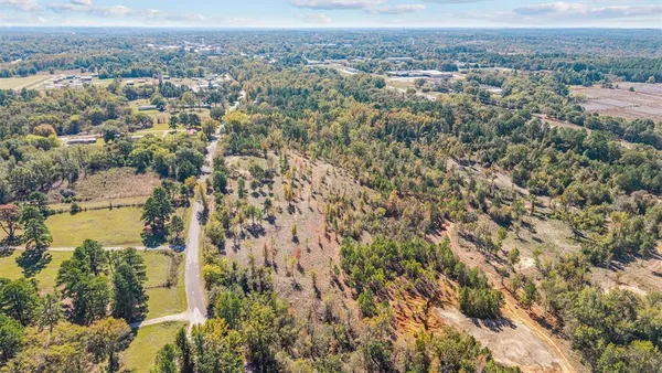 an aerial view of residential building and lake view