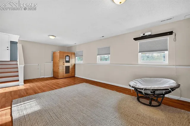 a workspace room with a table and chair