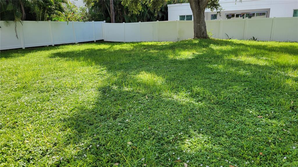 3932 Sunshine Avenue Sarasota, FL 34231 - Photo 17 of 17 a view of an outdoor space and a yard