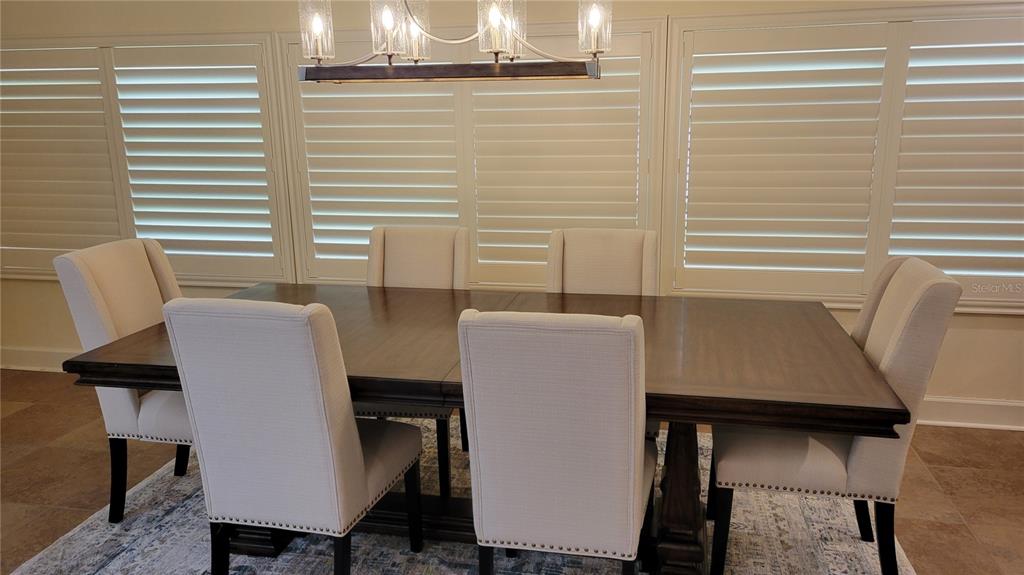 3932 Sunshine Avenue Sarasota, FL 34231 - Photo 7 of 17 a workspace with furniture and window