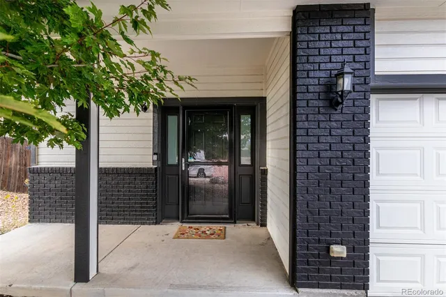a view of entrance gate of a house