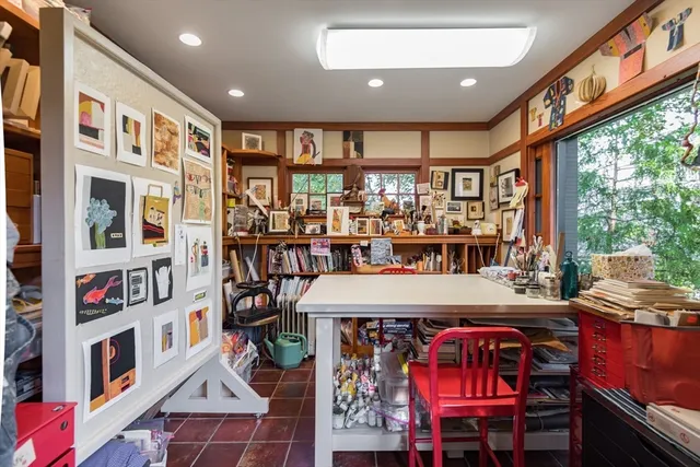 a view of a house with a yard and plants
