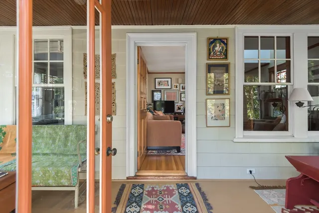 a front view of a house with a door and balcony