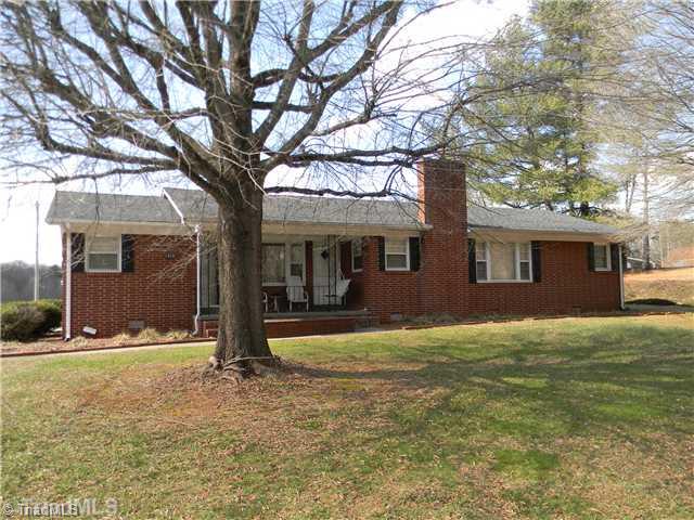 1518 Clingman Road Ronda, NC 28670 - Photo 1 of 10 Exterior Front. Large 3 bedroom//full baths brick home