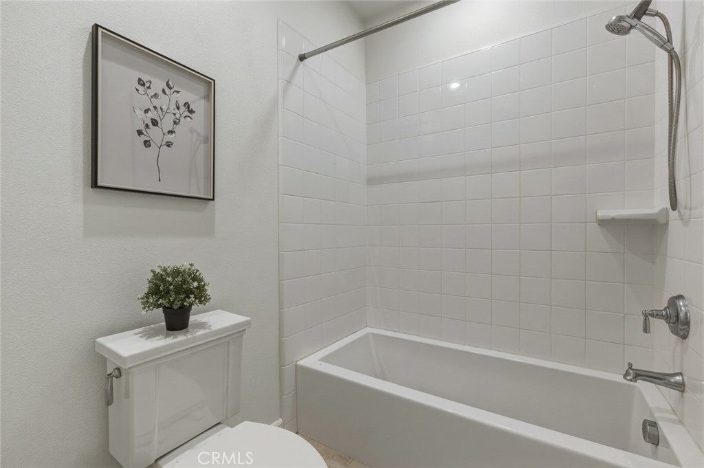 108 Henderson Irvine, CA 92620 - Photo 25 of 37 a white bath tub sitting next to a white toilet