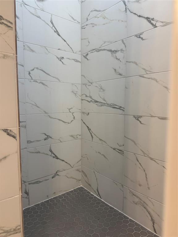 143 Ridge Road Tuscola, TX 79562 - Photo 14 of 24 a bathroom with a shower