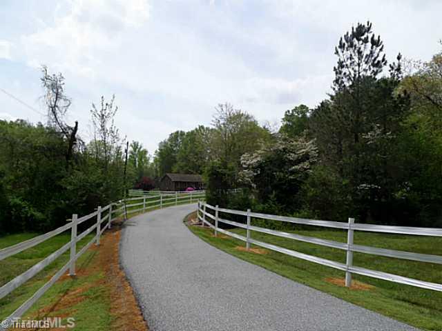 1258 Leake Memorial Church Road Germanton, NC 27019 - Photo 2 of 16 Land/Lot. House sits off the road with a long lovely driveway. Owners added this fencing after they purchased the house. Seller offering $3,000 in buyer paid closing costs with an acceptable offer.