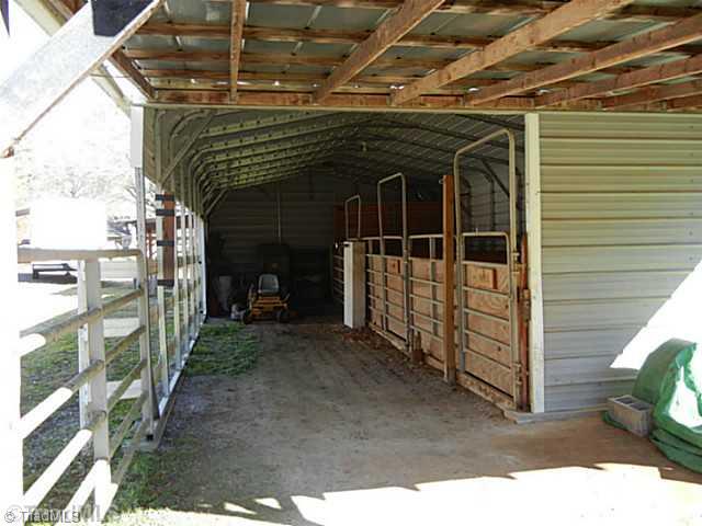1258 Leake Memorial Church Road Germanton, NC 27019 - Photo 12 of 16 Stable/Barn. 3 Stall barn and extra storage area added by the current owner.