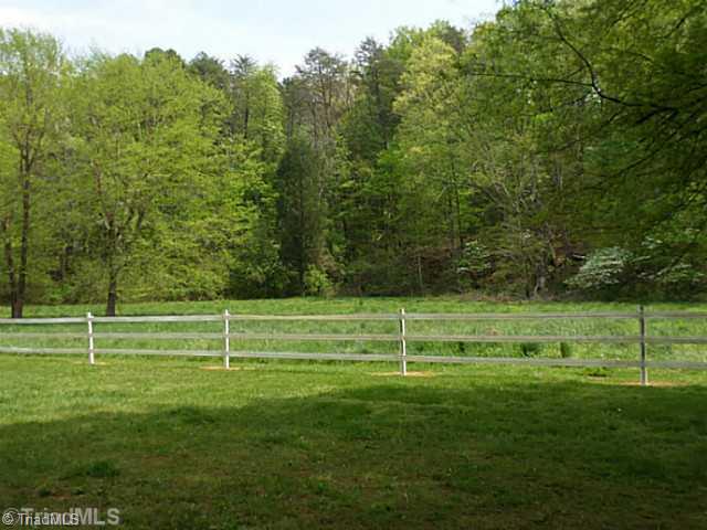 1258 Leake Memorial Church Road Germanton, NC 27019 - Photo 3 of 16 Land/Lot. Lovely private 6.22 acres with approx. 3 acres of pasture land and a creek for your horses.