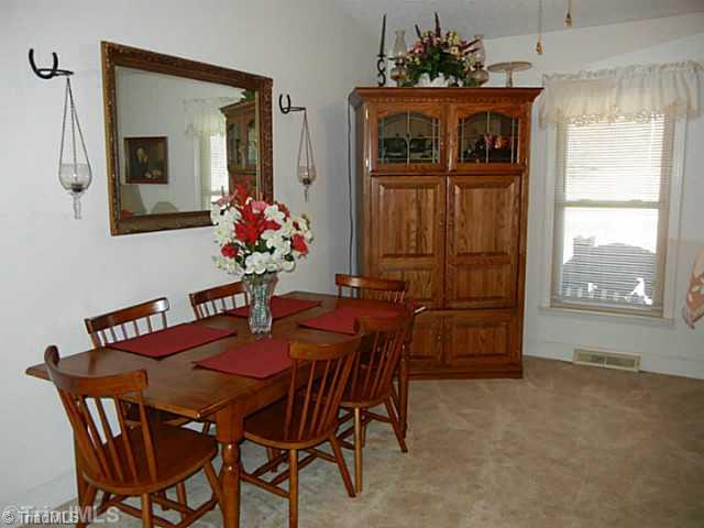 1258 Leake Memorial Church Road Germanton, NC 27019 - Photo 7 of 16 Dining Room. Dining room area off the living room.