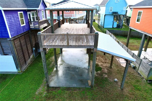 a view of a balcony with two chairs