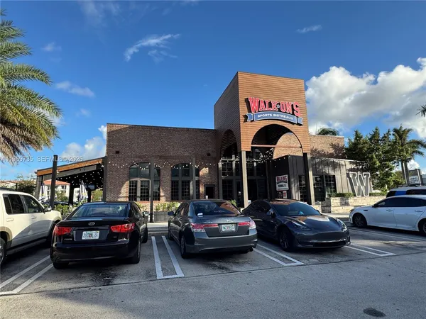 a car parked in front of a house