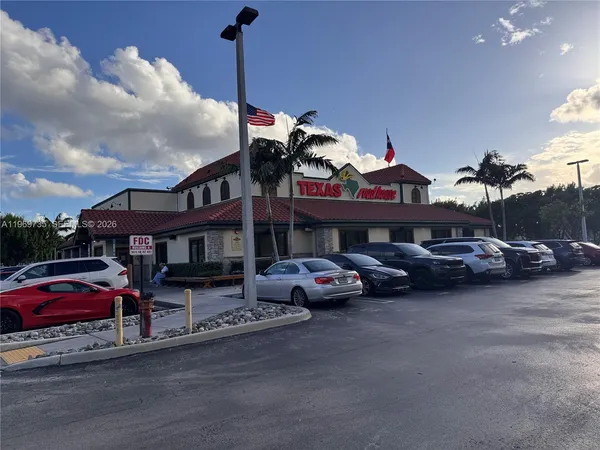 a car parked in front of a building