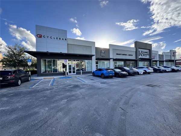 a car parked in front of a building
