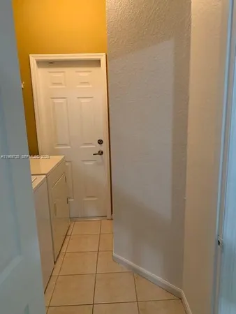 a bathroom with a granite countertop shower