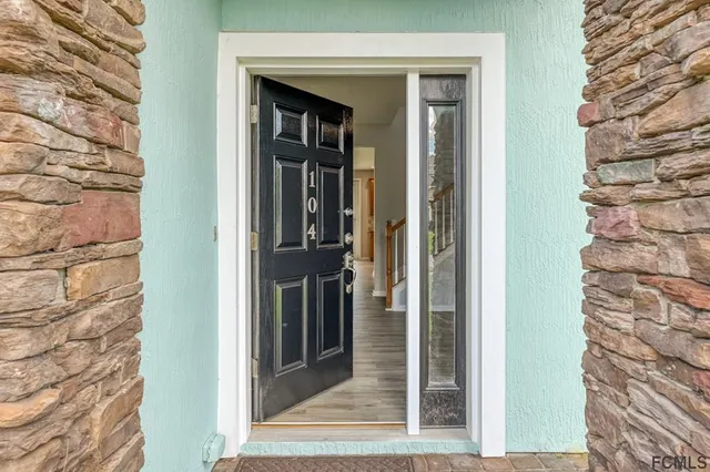 a view of a door front of a house