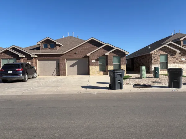 a car parked in front of a house