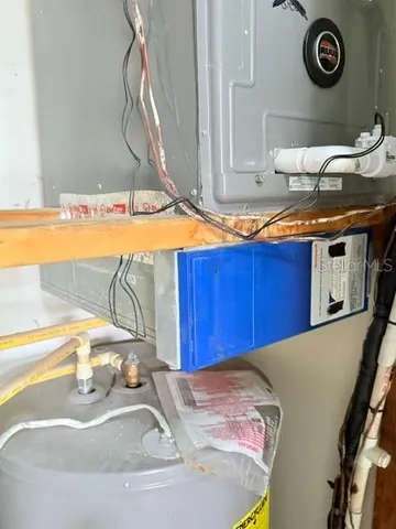 a view of a yard with large trees