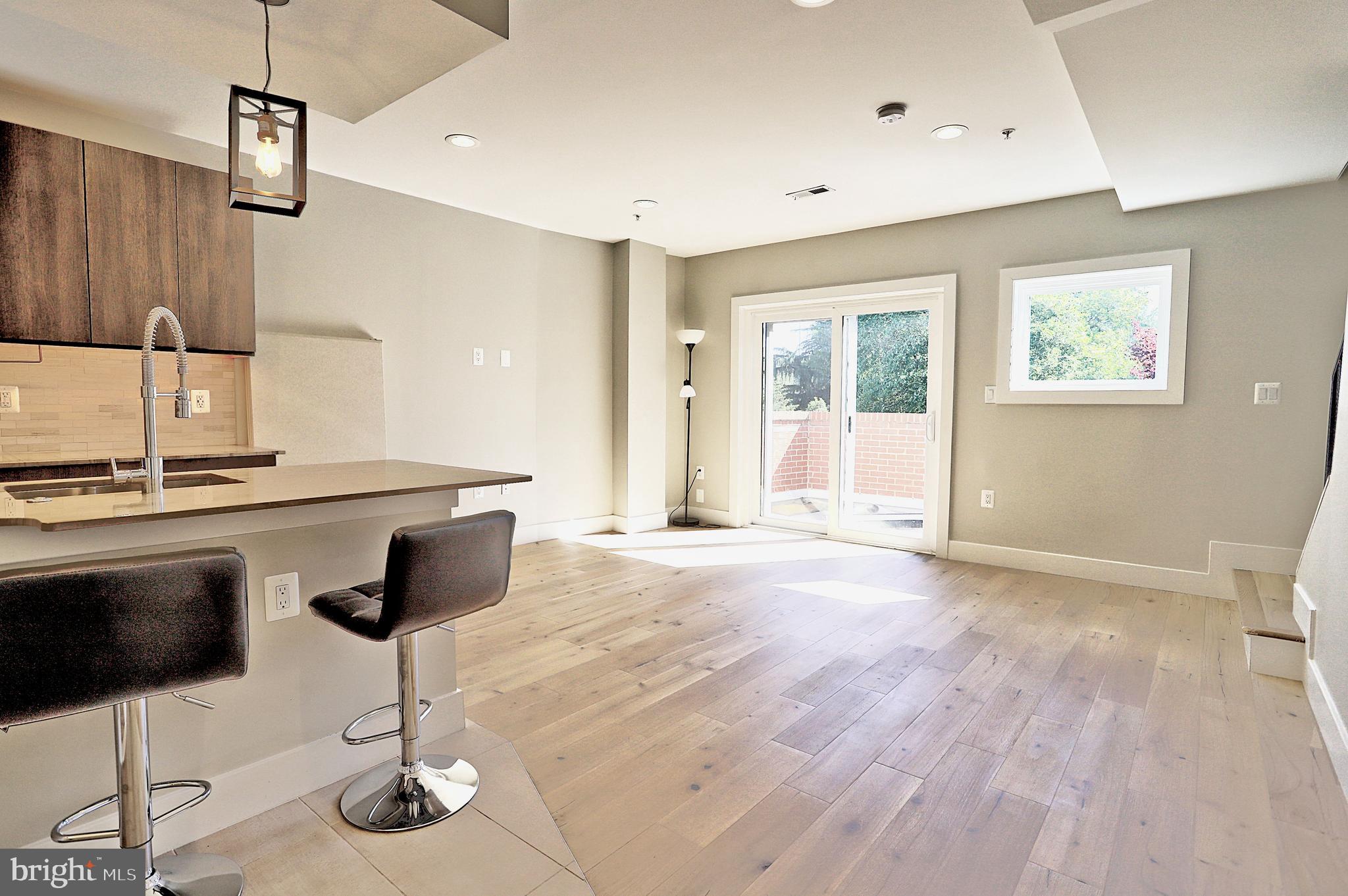 a view of livingroom with furniture and wooden floor