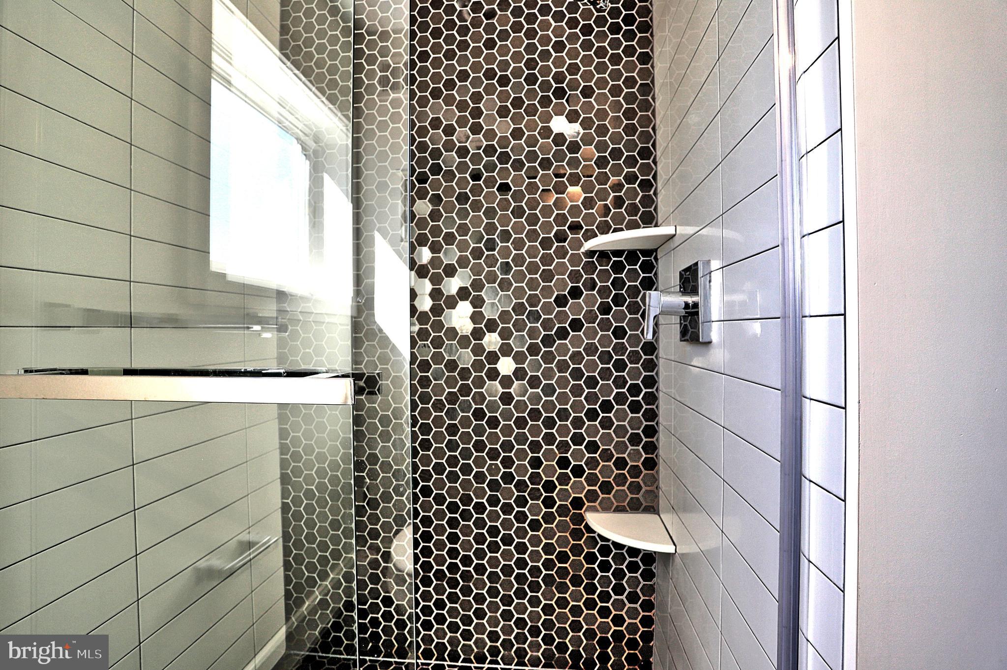 1723 Wisconsin Avenue Northwest, Unit B Washington, DC 20007 - Photo 18 of 20 a bathroom with a shower and a sink