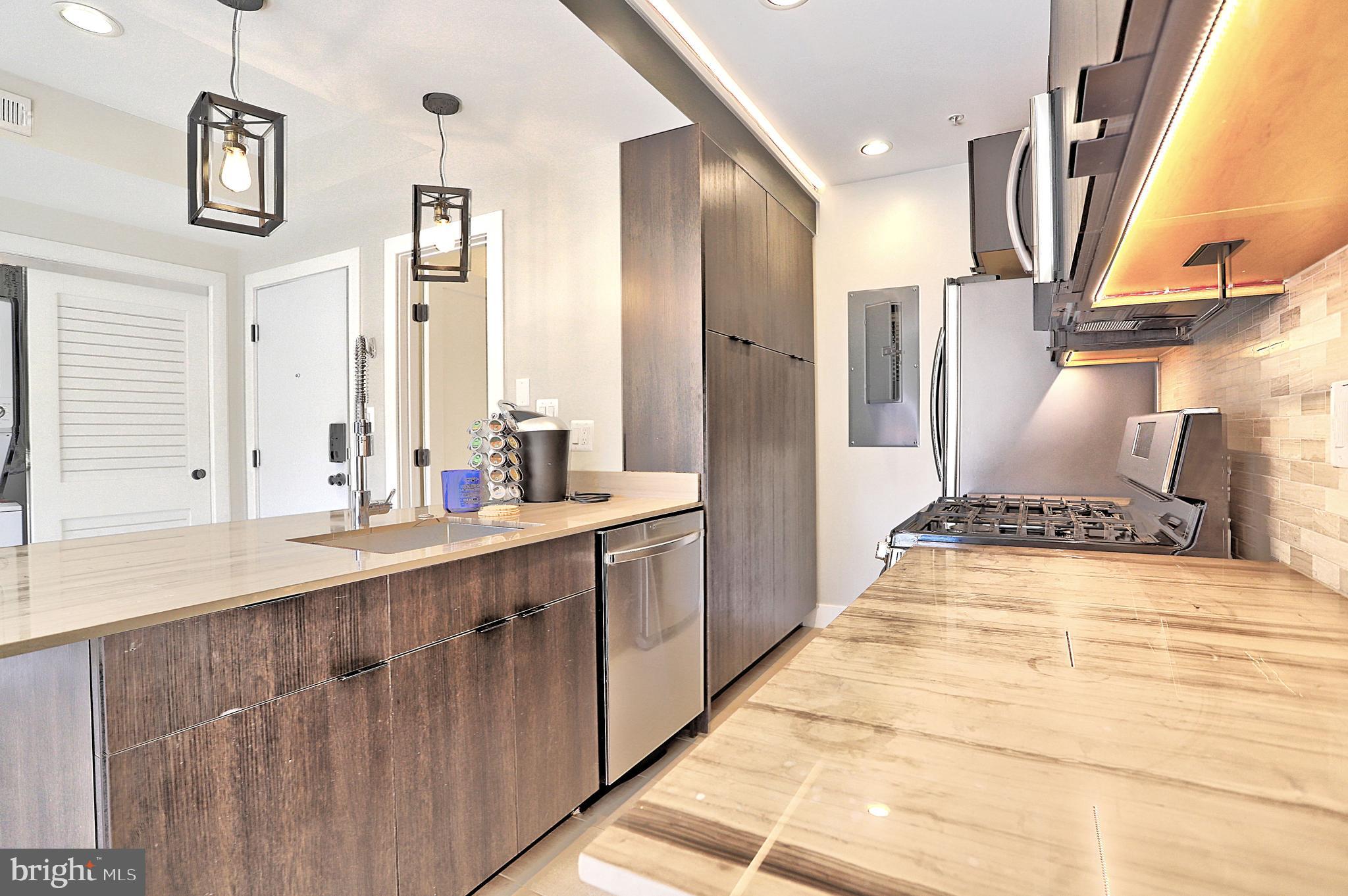 1723 Wisconsin Avenue Northwest, Unit B Washington, DC 20007 - Photo 6 of 20 a large bathroom with a double vanity sink and a mirror