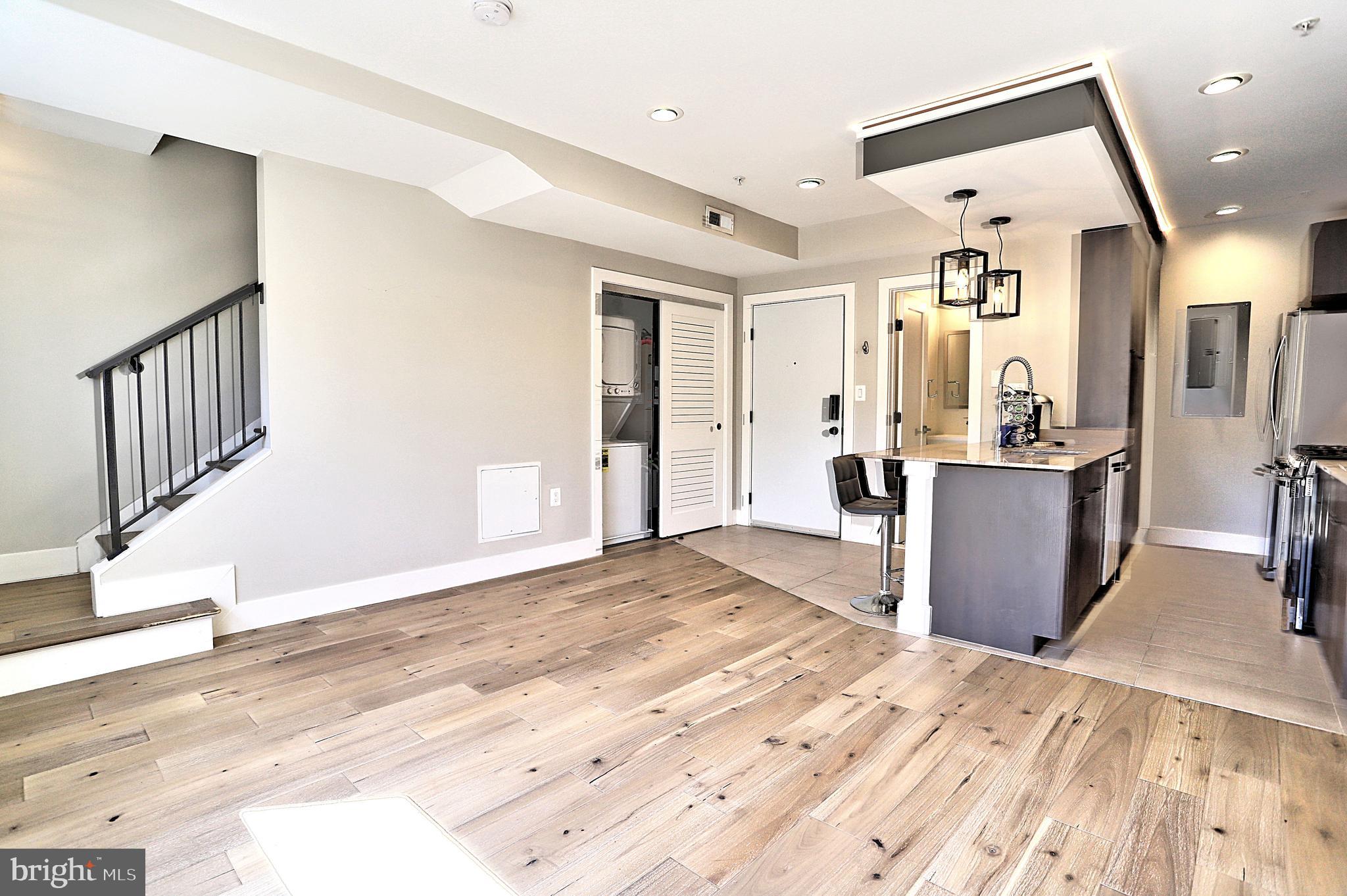 1723 Wisconsin Avenue Northwest, Unit B Washington, DC 20007 - Photo 10 of 20 a view of a kitchen with furniture and a window