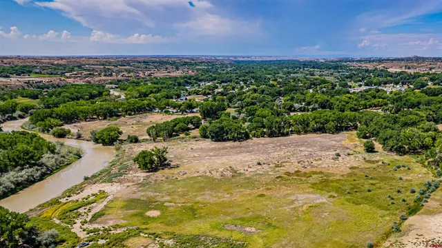 a view of a city with mountains in the background