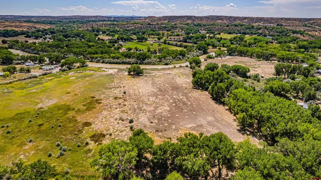 a view of a city with mountains in the background