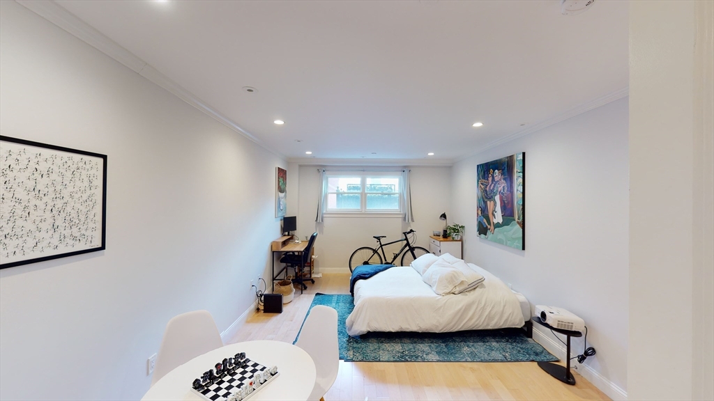 296 Beacon Street, Unit 2 Boston, MA 02116 - Photo 2 of 13 a living room with furniture and a couch