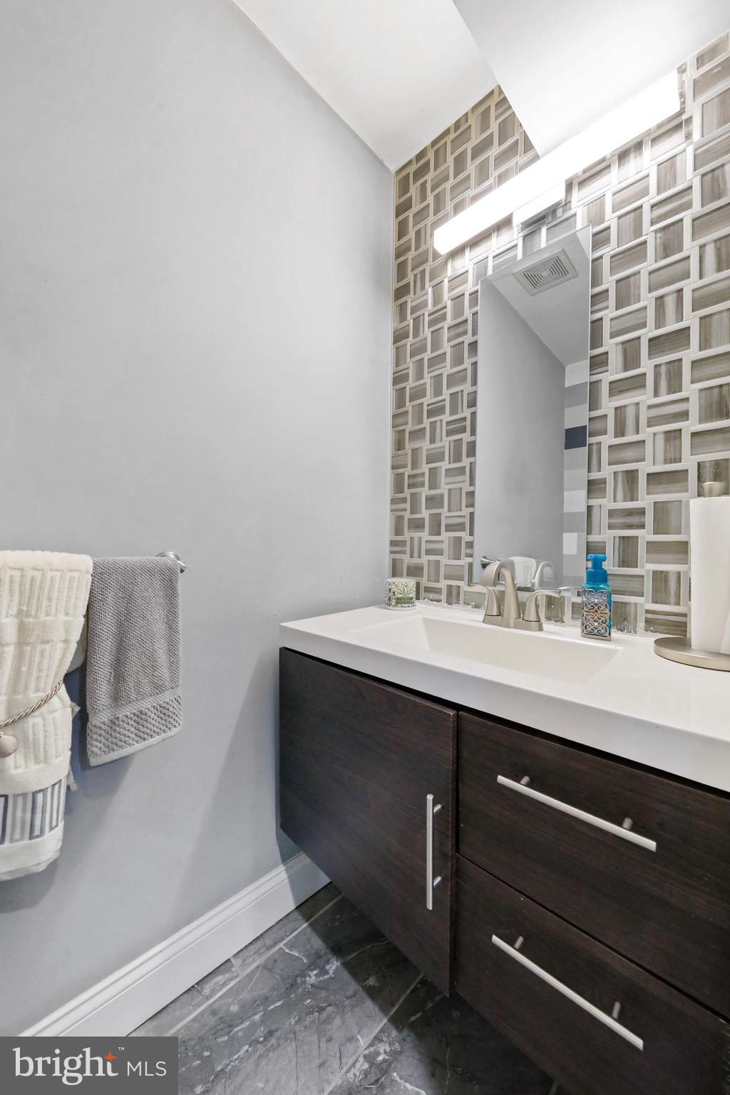 20 Pebble Lane Willingboro, NJ 08046 - Photo 13 of 38 a bathroom with a sink and a mirror