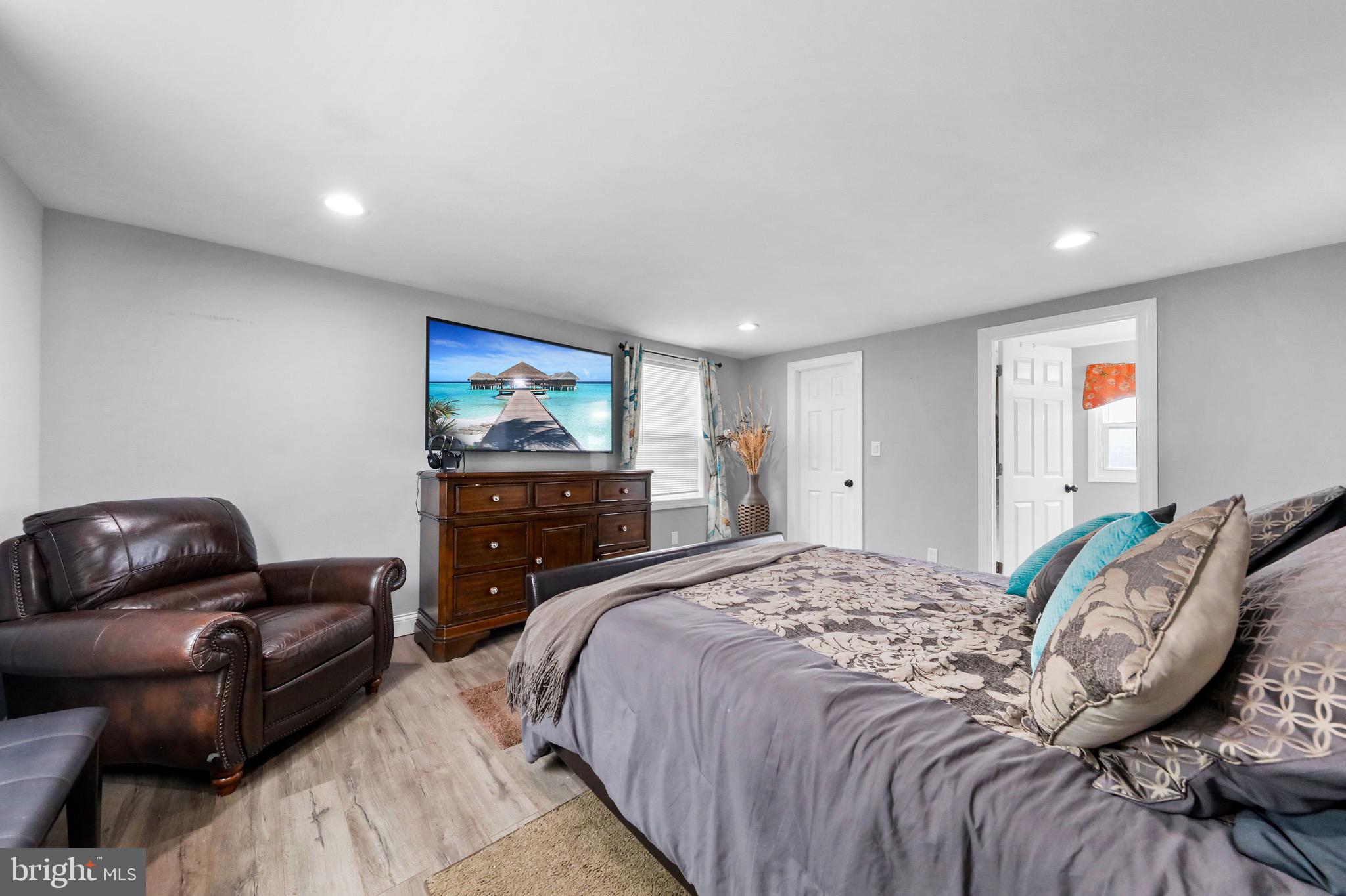 20 Pebble Lane Willingboro, NJ 08046 - Photo 25 of 38 a bedroom with a bed and a couch