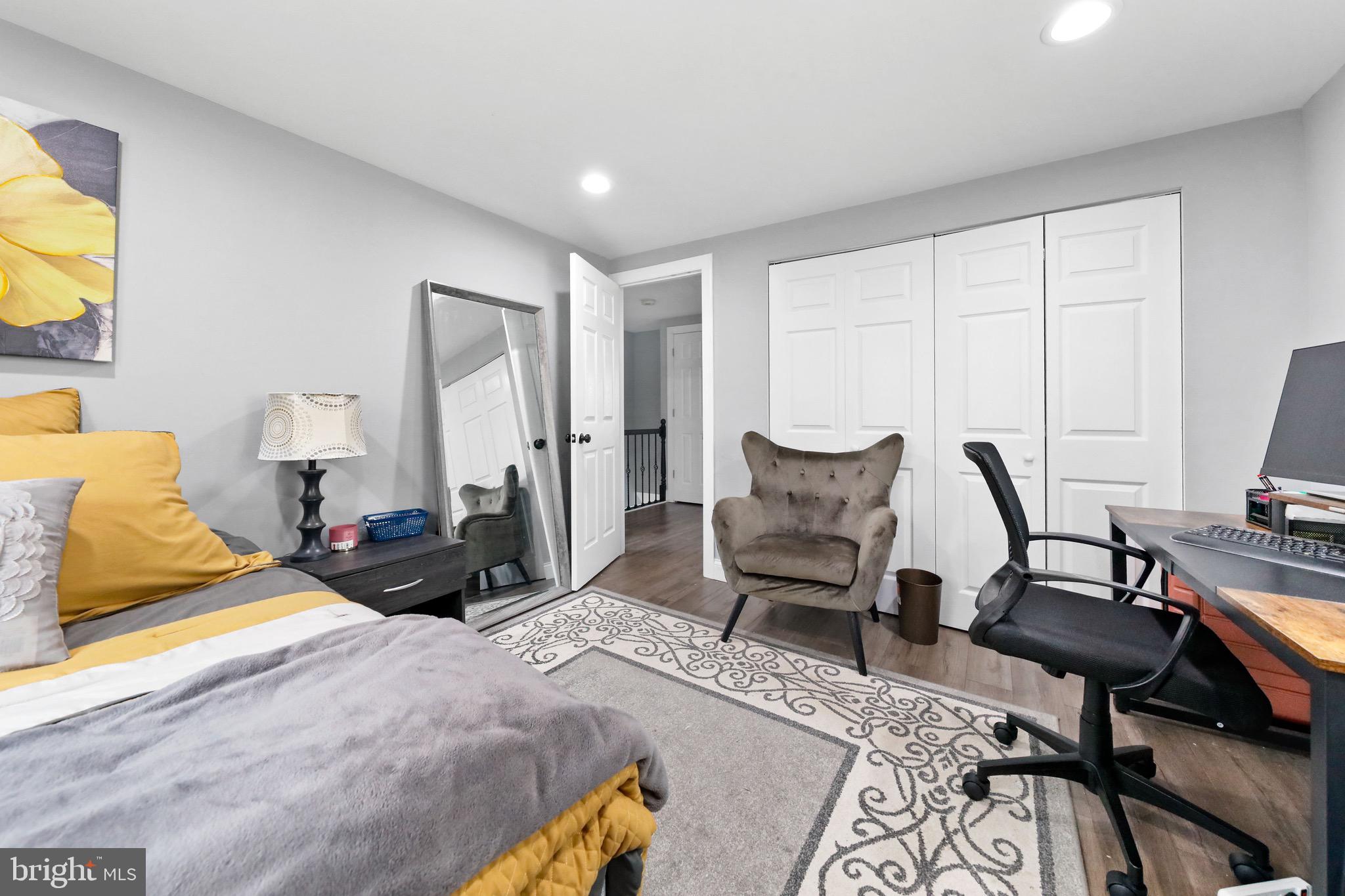 20 Pebble Lane Willingboro, NJ 08046 - Photo 29 of 38 a bedroom with a bed a chair and next to a window