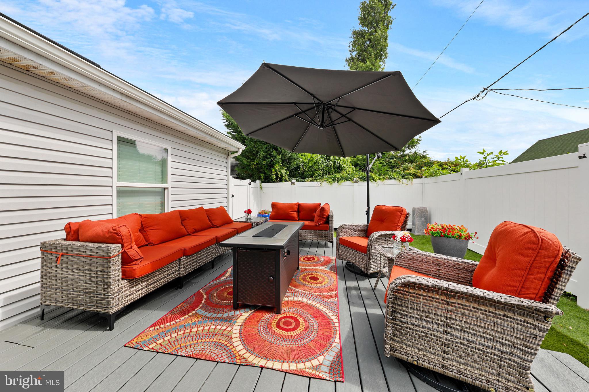 20 Pebble Lane Willingboro, NJ 08046 - Photo 36 of 38 a outdoor living space with furniture and umbrella