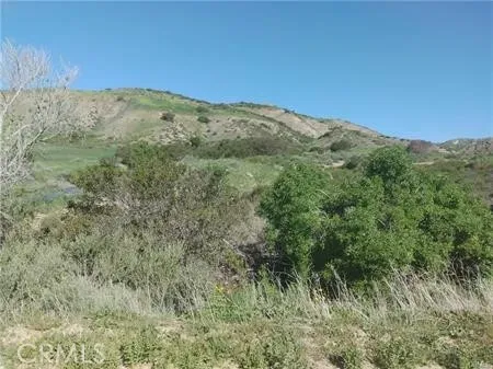 a view of mountains and valleys