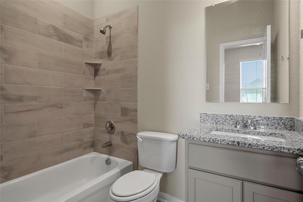 3205 Dottavio Road Lorena, TX 76655 - Photo 27 of 33 a bathroom with a sink toilet and shower
