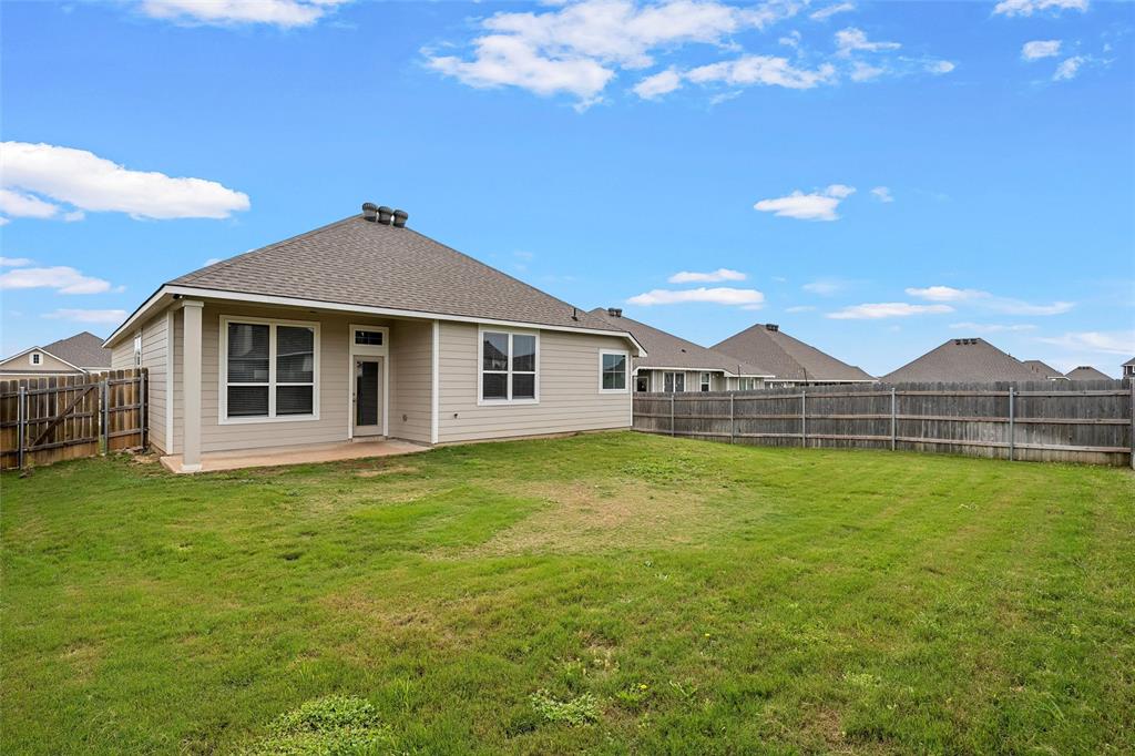 3205 Dottavio Road Lorena, TX 76655 - Photo 31 of 33 a view of a house with a big yard