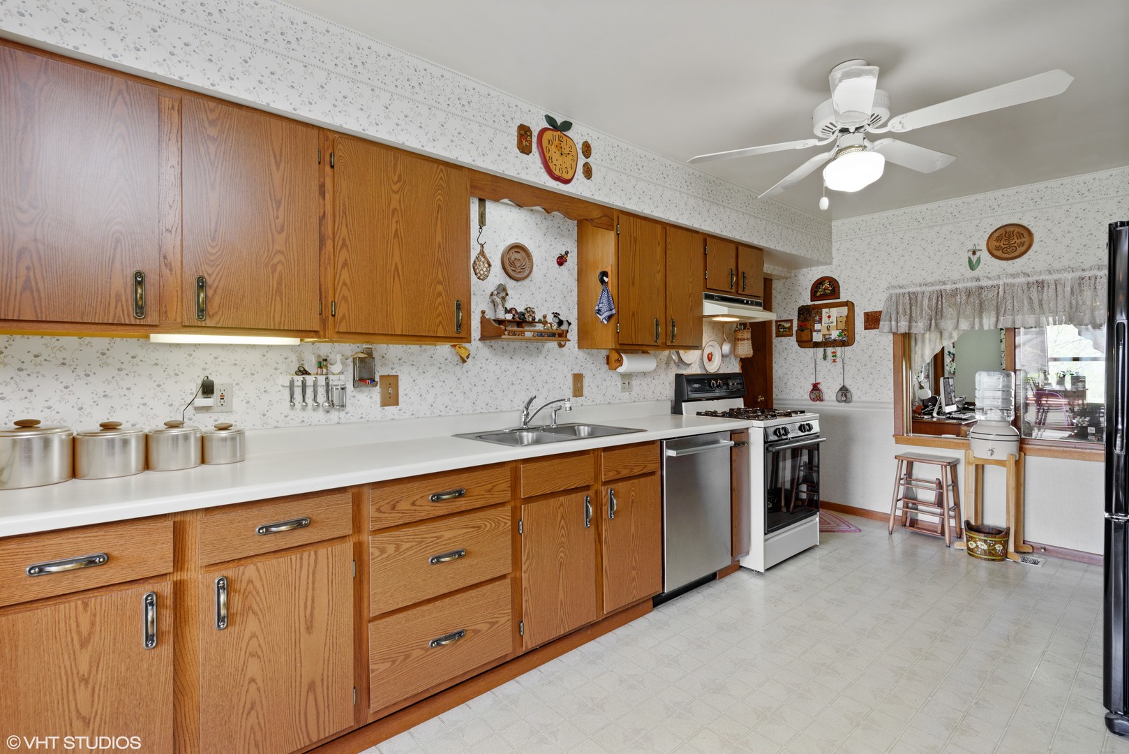 37W793 Binnie Road Dundee, IL 60118 - Photo 15 of 34 a kitchen with white cabinets and white appliances