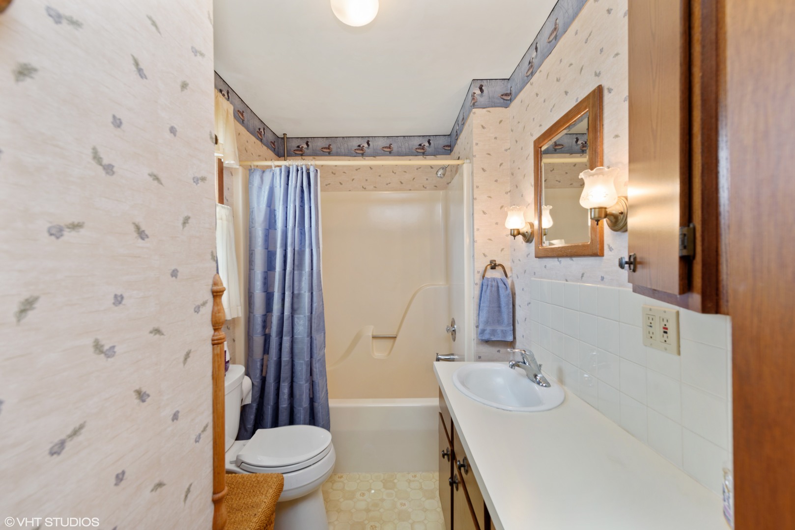 37W793 Binnie Road Dundee, IL 60118 - Photo 19 of 34 a bathroom with a sink a toilet and shower curtain