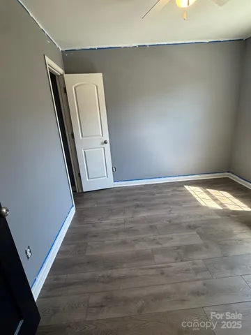 a view of a hallway with staircase