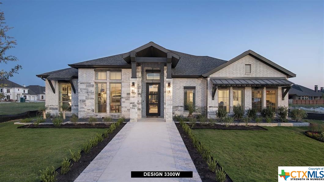 7948 Valley Pointe Fair Oaks Ranch, TX 78015 - Photo 1 of 1 a front view of a house with a yard